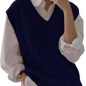This is a oversized navy sweater vest. It is a size small. From Juliet Holy.